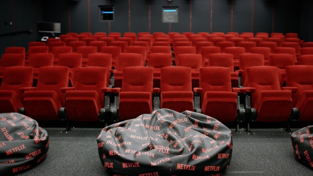 Empty chairs in Netflix screening room