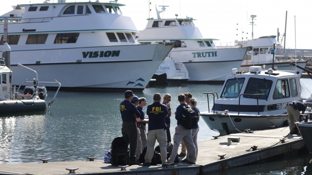 FBI personnel on a jetty