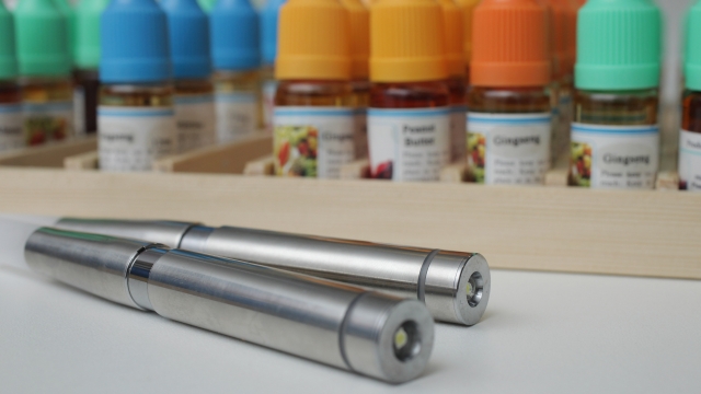 Electronic cigarettes and bottles containing the flavored liquids they use