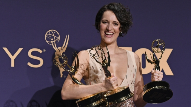 Phoebe Waller-Bridge holds her three 2019 Emmy Awards