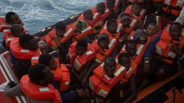 Refugees and migrants on a rescue boat