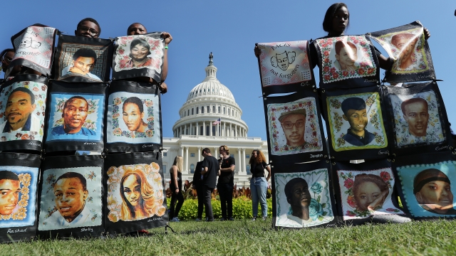 Gun reform activists protest outside the Capitol