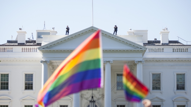 LGBTQ Pride flag waving in front of the White House