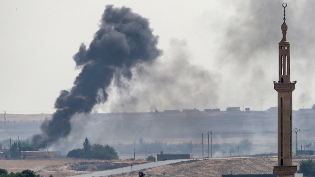 Smoke rises over the Syrian town of Tel Abyad