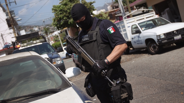 Mexican federal police officer on patrol in state of Guerrero.