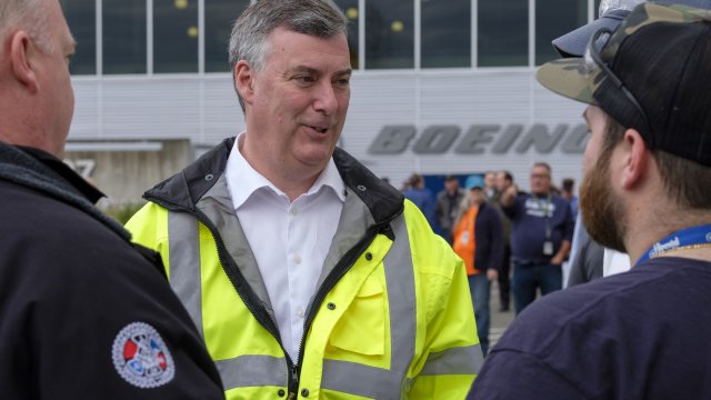 The now former Boeing Commercial Airplanes CEO Kevin McAllister talks with employees in 2018.