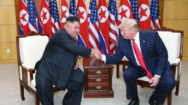 President Trump and Kim Jong-un shake hands