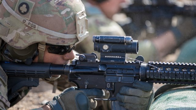 A U.S. soldier fires a M4 carbine at a range on Qayyarah West Airfield, Iraq, June 4, 2019
