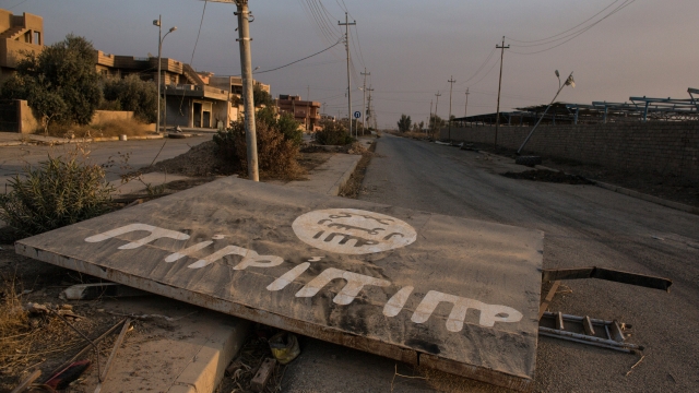 A fallen ISIS billboard