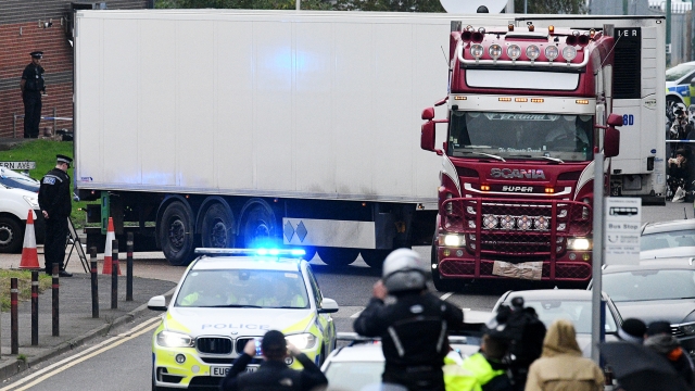 Truck surrounded by English police