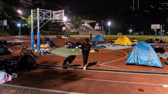 Protesters sleep in tents and sleeping bags at a sport ground at Chinese University of Hong Kong on Nov. 14, 2019