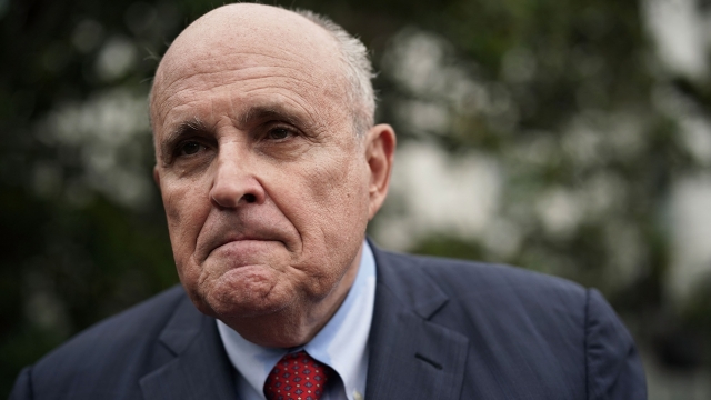 Rudy Giuliani, former New York City mayor and current lawyer for U.S. President Donald Trump, speaks to members of the media