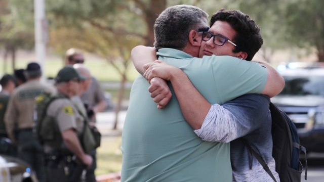 A father and son after the shooting at Saugus High School on Thursday, Nov. 14.