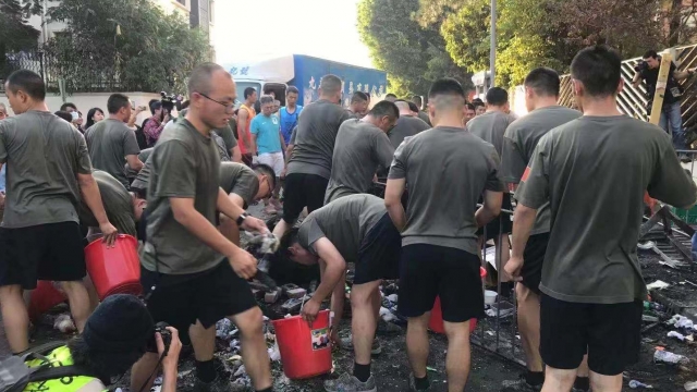 Chinese troops clean up Hong Kong streets
