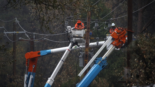 Pacific Gas & Electric Co. employees working on power lines
