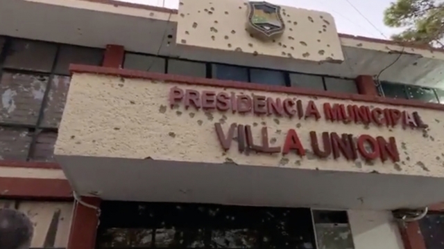 The City Hall of Villa Union is damaged with bullet holes