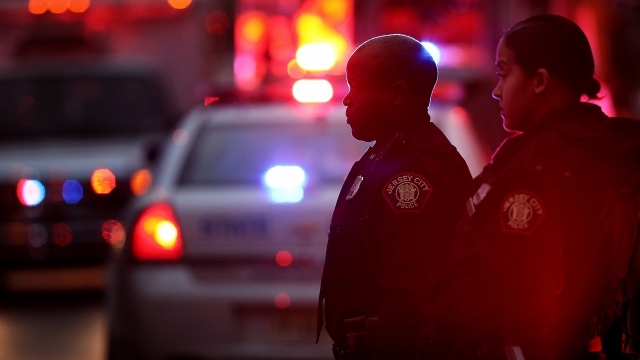 Emergency personnel on the scene of a shooting in Jersey City, New Jersey