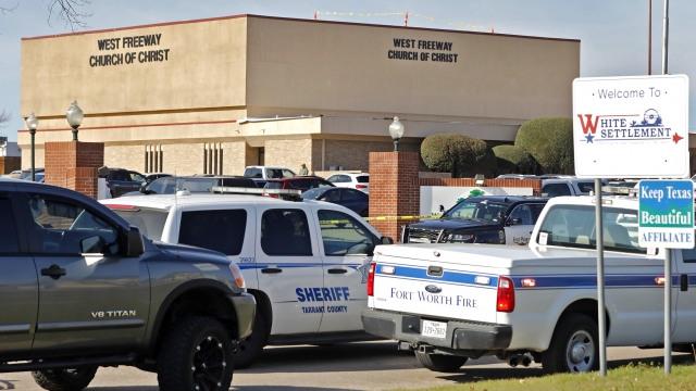 Law enforcement vehicles parked outside West Freeway Church of Christ