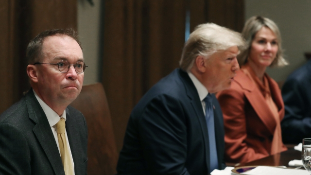 Acting White House Chief of Staff Mick Mulvaney with the president on Dec. 5.