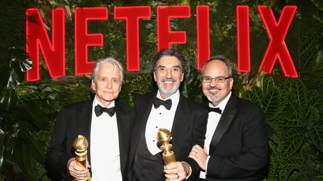 Michael Douglas, Chuck Lorre and Al Higgins at a Netflix-hosted party