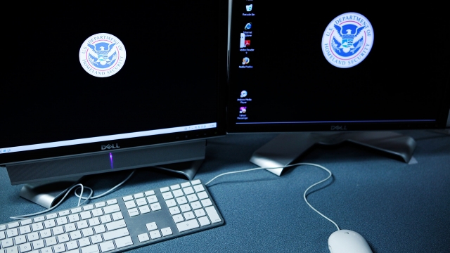 The logos of the U.S. Department of Homeland Security are seen on computer terminals in a training room