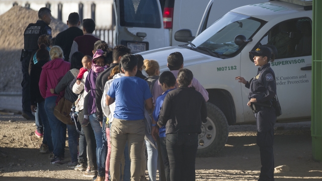 Migrants detained by U.S. border agents