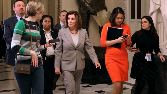 House Speaker Nancy Pelosi walks through U.S. Capitol.