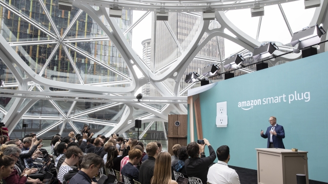 Employees attend presentation at Amazon's Seattle headquarters in 2018.