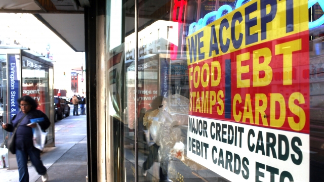 A sign advertising the acceptance of food stamps