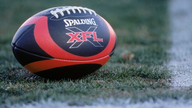 View of XFL football on the field.