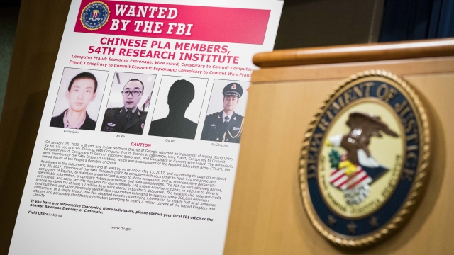 "Wanted" poster for hacking suspects