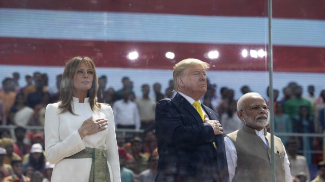 President Trump, first lady Melania Trump and Indian Prime Minister Modi stand for the national anthem at 'Namaste Trump'