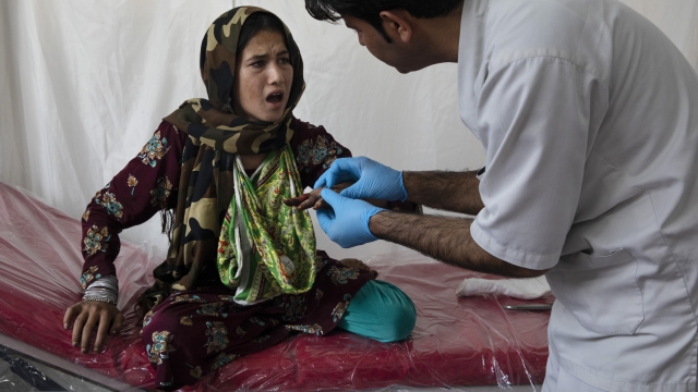Girl receives medical care in Kabul