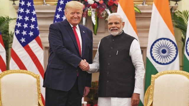 President Donald Trump and Indian Prime Minister Narendra Modi shake hands