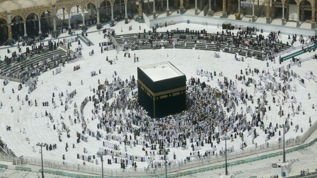 Muslims pray around the Kabba in Mecca