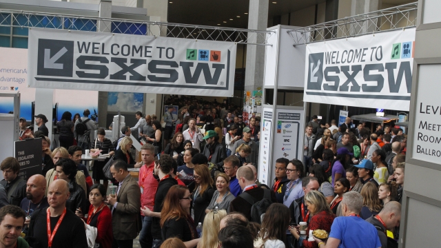 SXSW banners and attendees