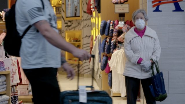 Person wearing mask in airport