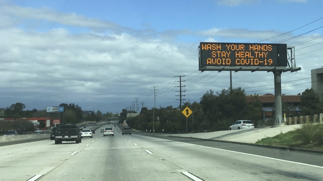 Freeway sign in California warns of coronavirus