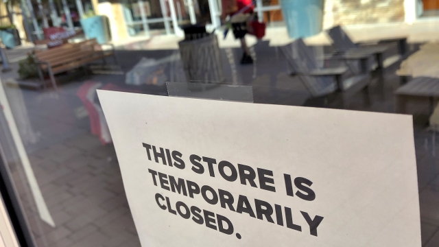 A closed sign in a store window