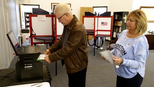 Greg Froehlinch and his wife Deb take advantage of early voting, Sunday, March 15, 2020, in Ohio.