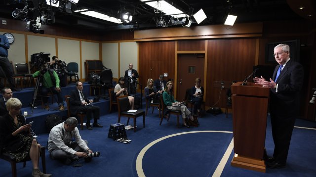 Senate Majority Leader Mitch McConnell speaks to the press