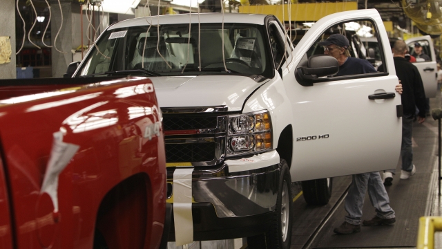 A man works on a General Motors assembly line