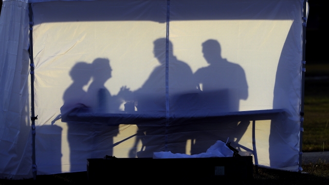 Medical personnel outside a coronavirus testing tent in Florida