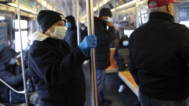 Subway riders in New York wearing masks