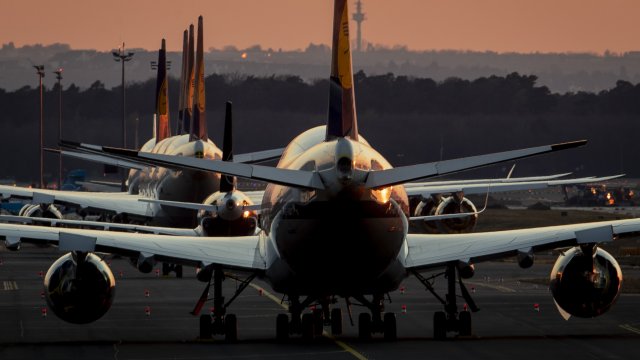 Lufthansa aircrafts are parked at the airport in Frankfurt, Germany.