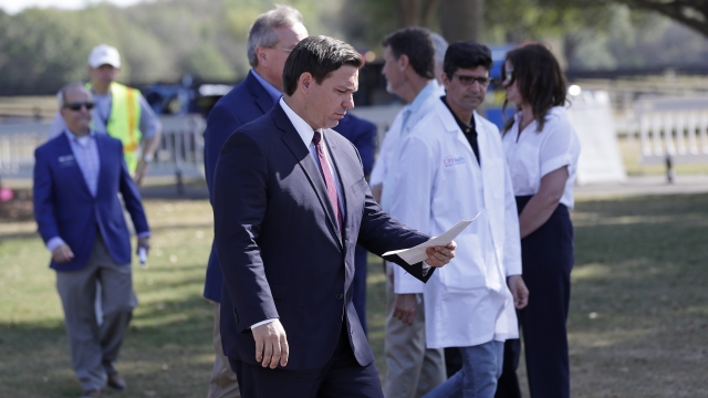 Florida Gov. Ron DeSantis arrives at a mobile testing site for coronavirus in The Villages, Fla., on March 23.