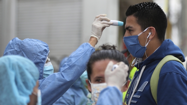 Colombian nurses testing travelers for coronavirus