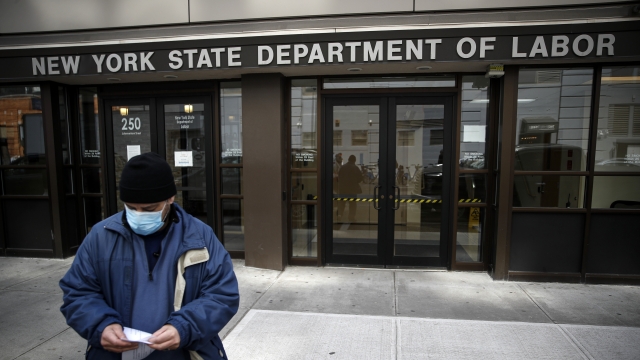 Man stands outside the New York State Department of Labor
