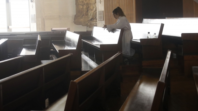Choir member in almost empty California church