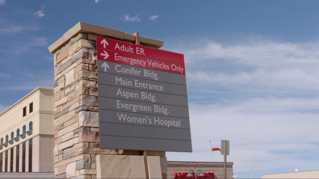 Hospital sign with directions to the ER